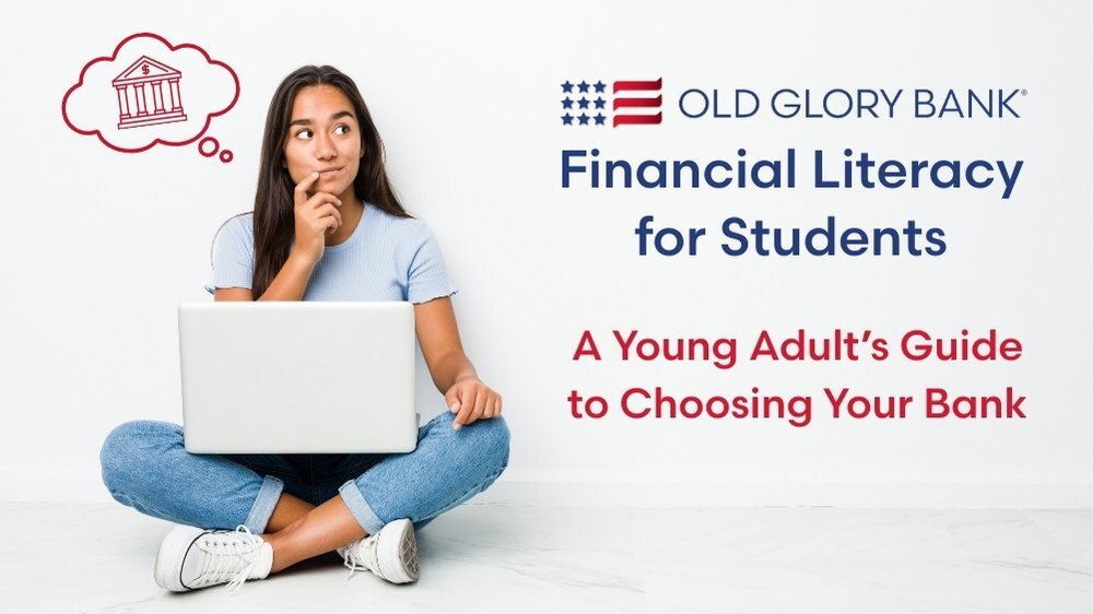 Young woman sitting with laptop